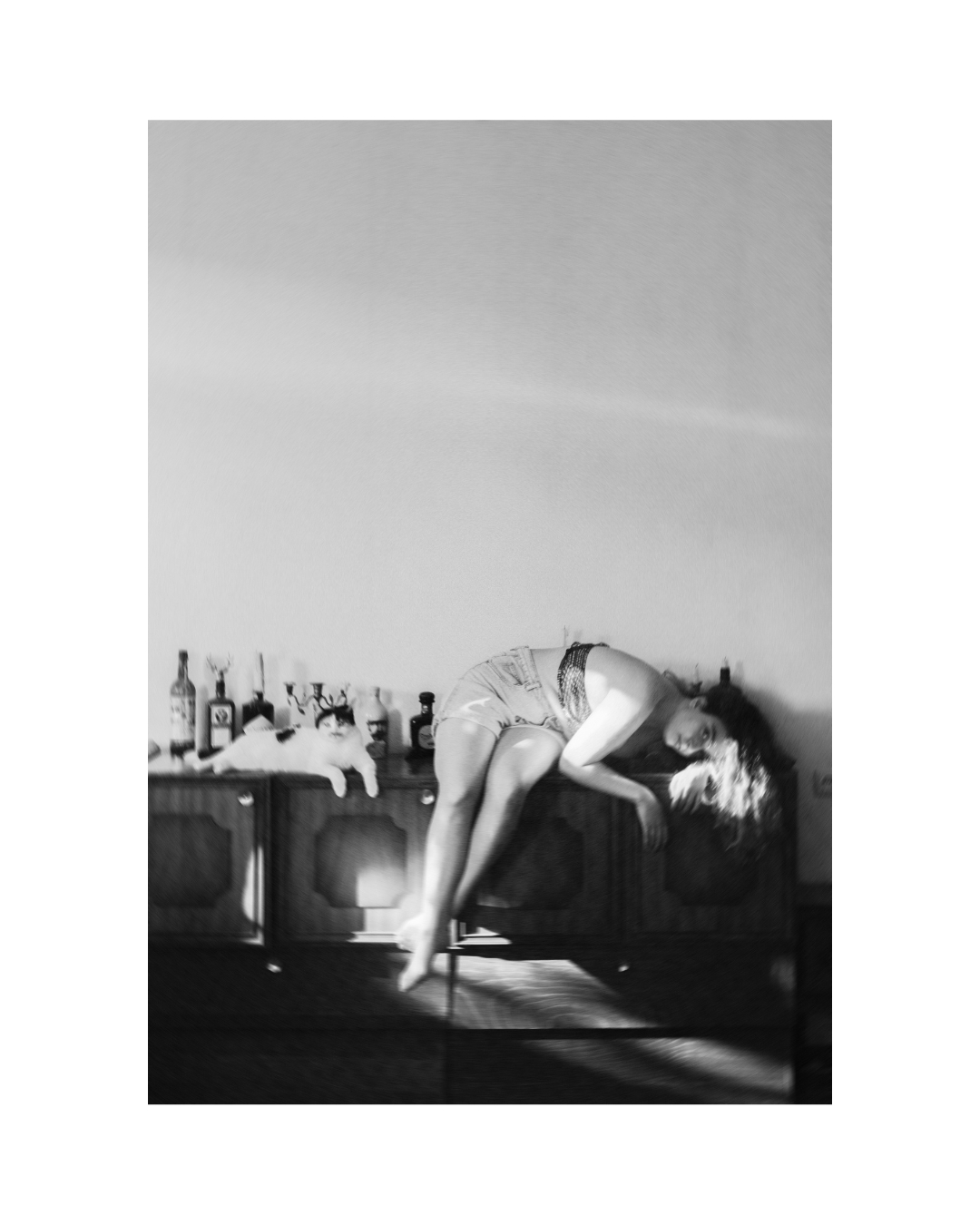 - Aksana, woman in house, artistic photography